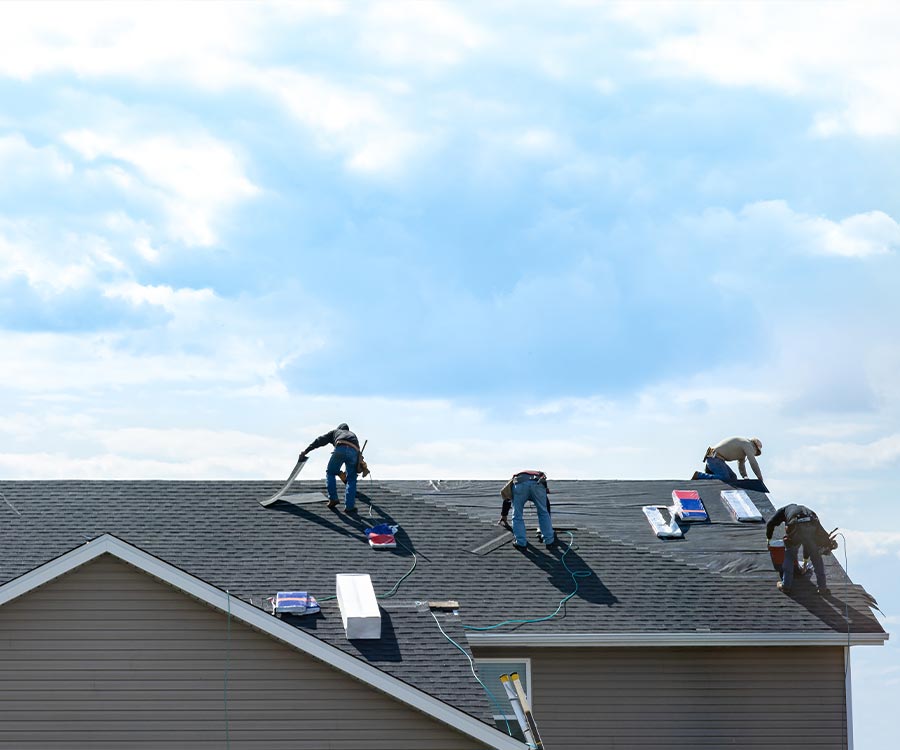 Roofs R Us replacing a shingled roof in Blaine, MN