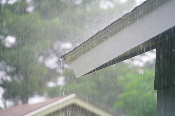 rain falling down from a roof